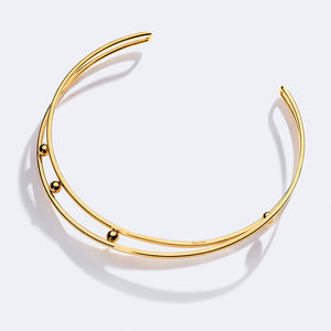 Yellow gold-tone brass